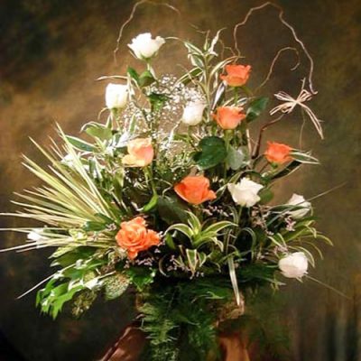 Long Stemmed Imported Roses Arranged In A Vase